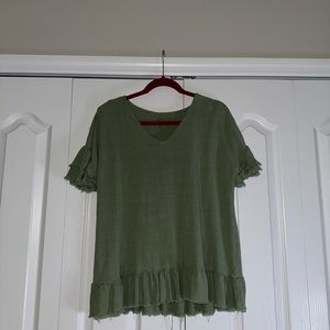 green flowy shirt from local boutique